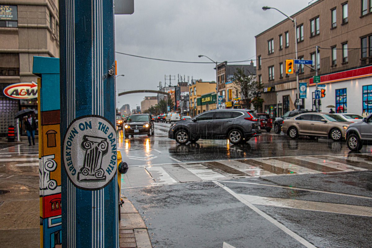 AGreatCapture's tweet photo. Out and about in the rain on the #Danforth #ShowloveTO #DanforthBIA #shoplocal #greektown #TorontoExplore #photography https://t.co/KpOfIVbUoW