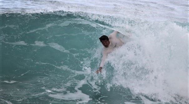 @pip_says @HGISnowdonia Surfing in Wales! Who knew? Very cool! Here's a dude bodysurfing in Honolulu.