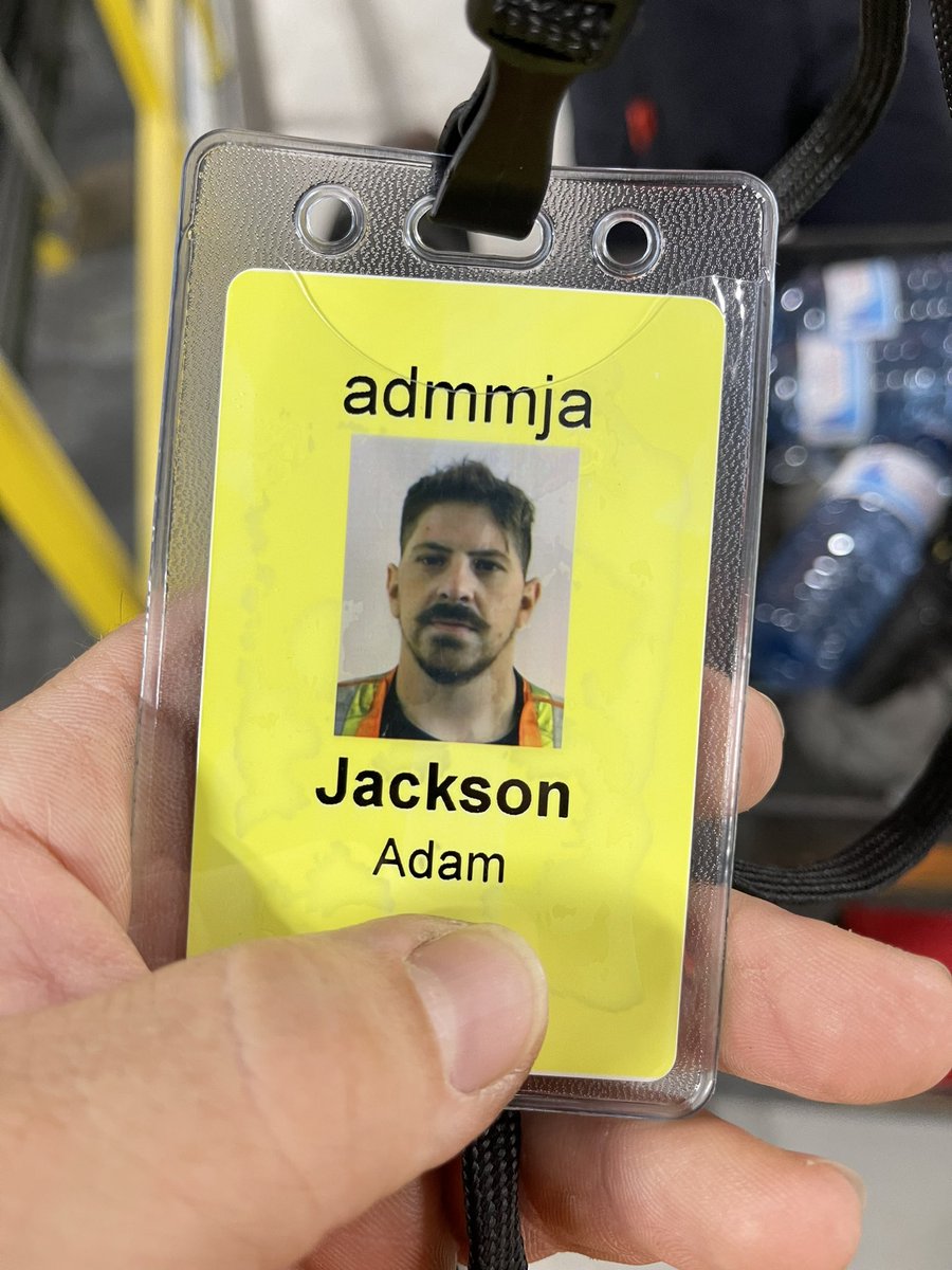 Two very different work mugshots, taken exactly two years apart.