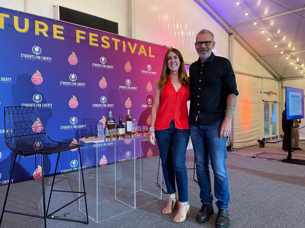 Kiradavis's tweet photo. At #FreerFutureFest watching the best political panel Iโve ever seen. Whiskey is Freedom with @mattkibbe and wife Teri. Iโm on my second sample tray. Donโt tell anyone. https://t.co/4Ez3hUEoMo