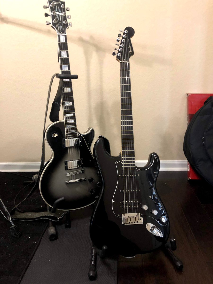 LanceHaacke's tweet photo. @VinceWombat Here’s my “None More Black” Strat next to my Les Paul. https://t.co/JrETKnwBpz