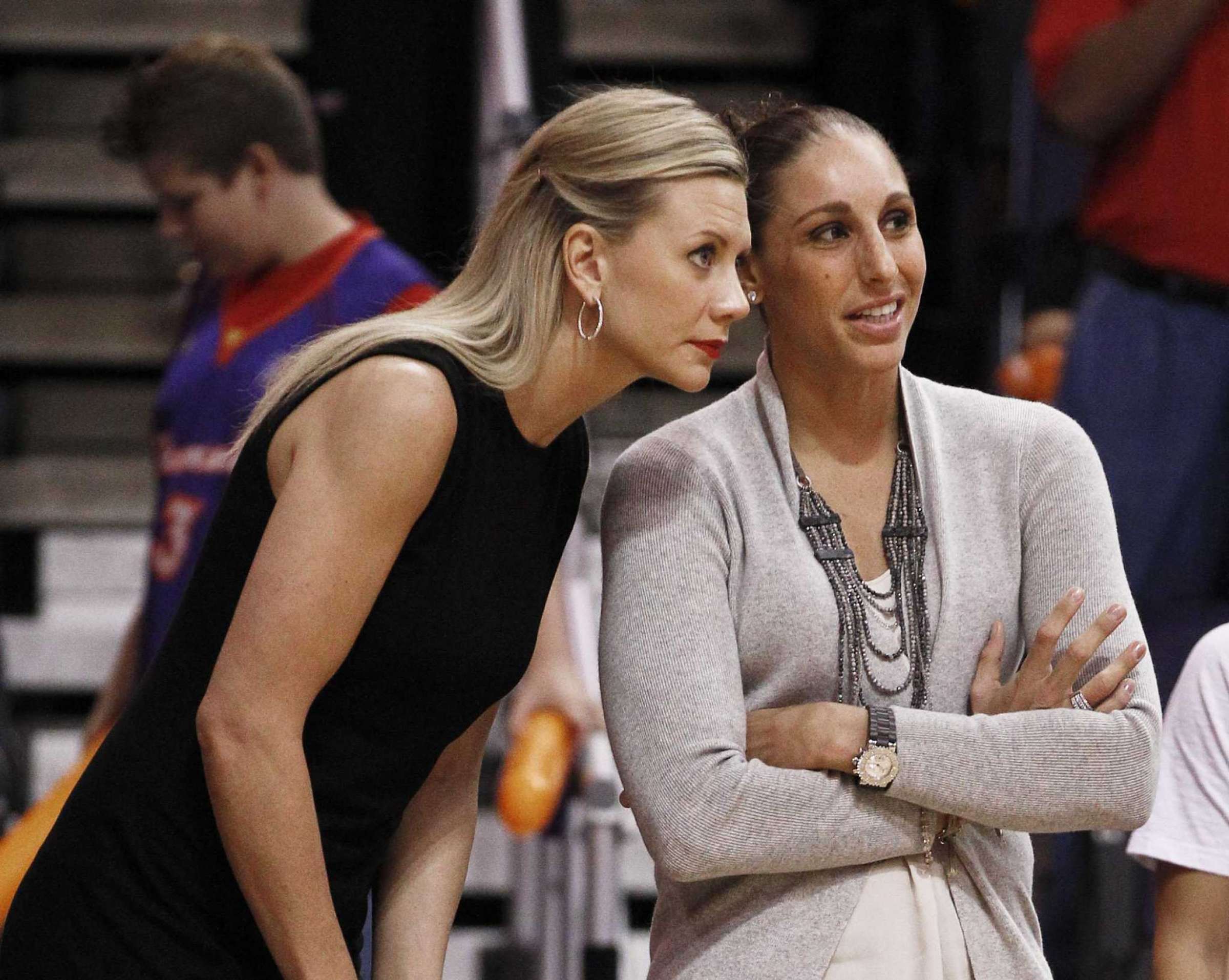 Basketball legend Diana Taurasi and wife Penny Taylor second