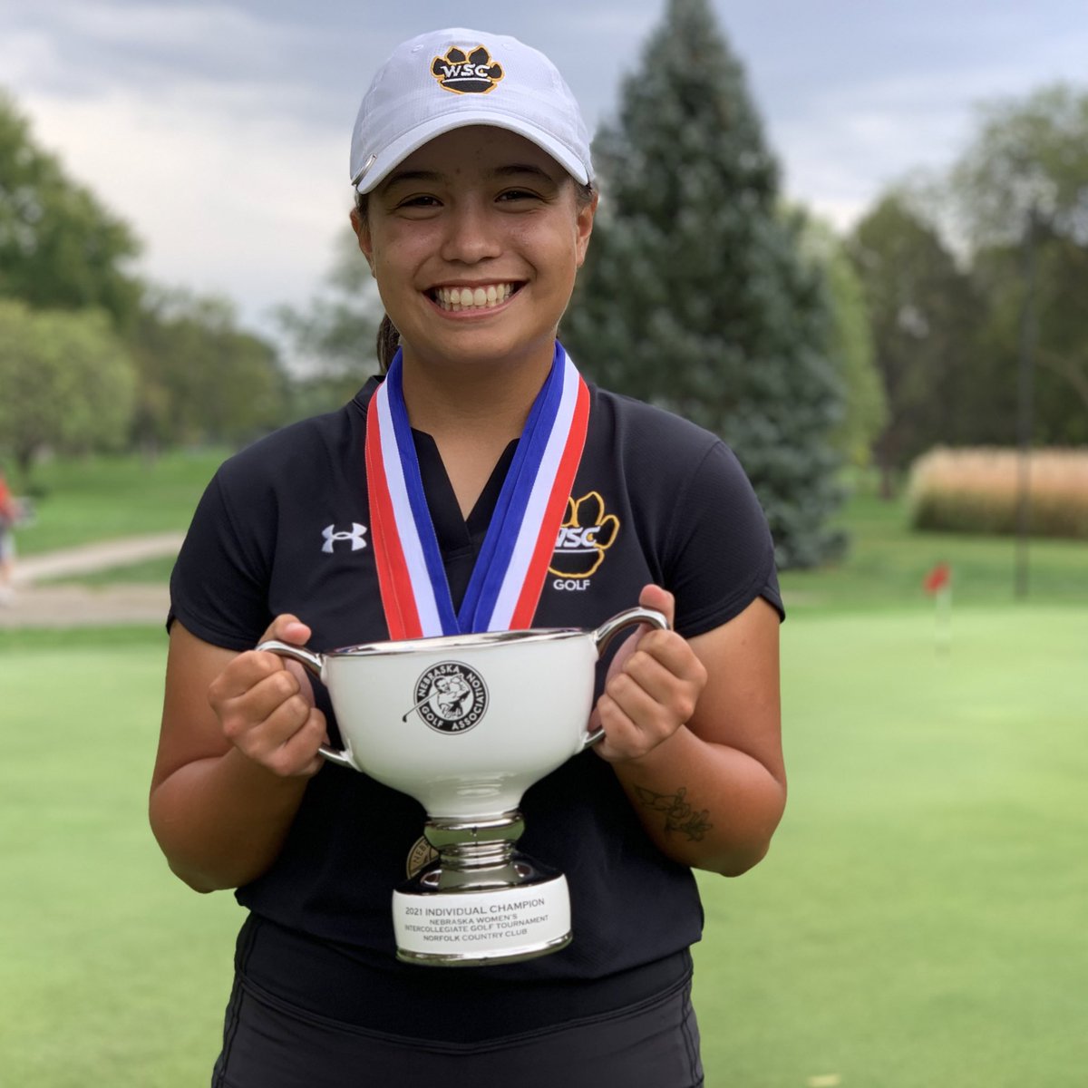 NGAgolf's tweet photo. The 2021 #NebIntercollegiate Women’s Champion by SEVEN strokes

Jazmine Taylor of @WayneStateGolf 
73-77 | 150 (+6) https://t.co/6EsPTJRPsC