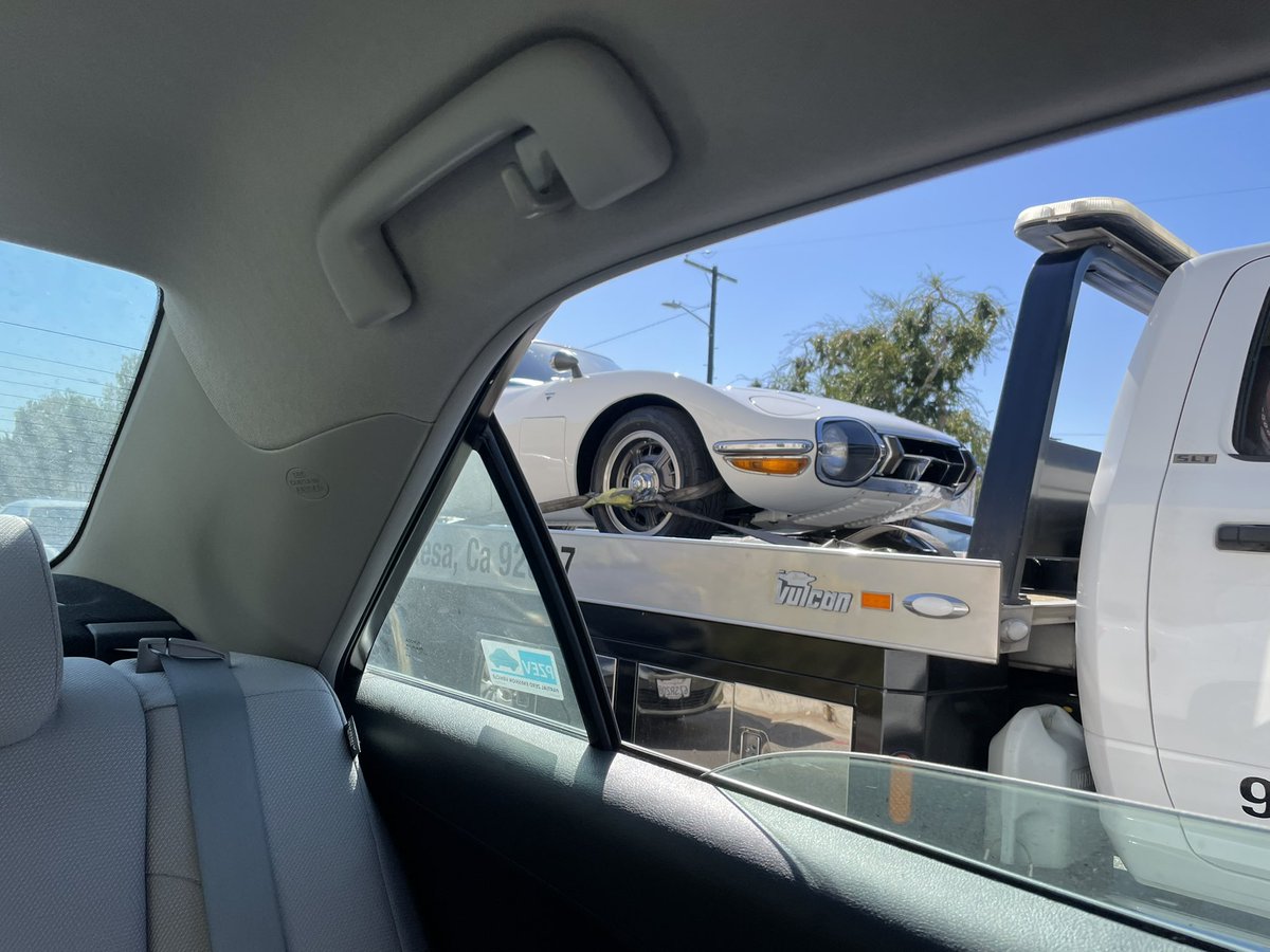 415chen's tweet photo. @DougDeMuro just spotted a 2000GT casually on an open flatbed in LA. You’d think the owner would opt for an enclosed trailer. https://t.co/z8w77IjeZt
