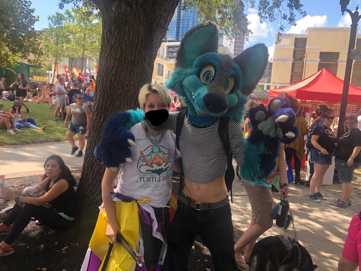 I met @Neon_woof at Orlando Pride! He said “I love your whole face”. Absolutely made my day. Y’all he was so nice. My little gay furry heart 🥺

#fursuit #Orlandopride #Pride2021