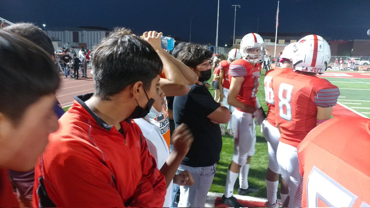 The Henderson football team really enjoyed taking in the game from the sideline!  It's quite a different experience being in the middle of all the excitement among the varsity players and coaches.  They loved it!