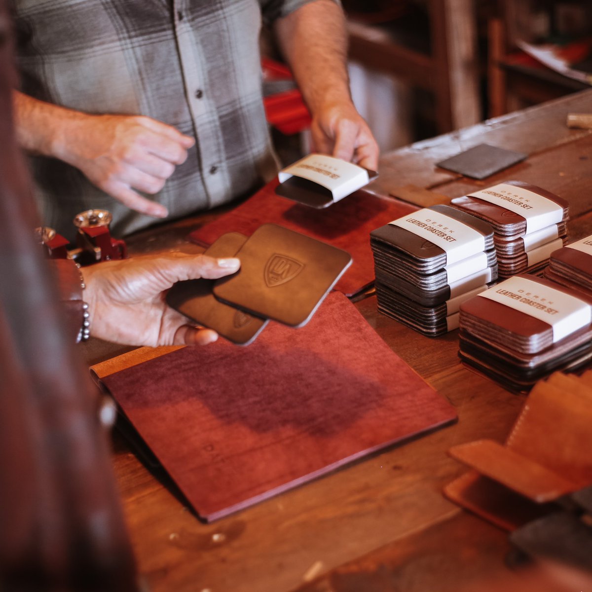 We’re loving these leather coasters featuring our classic DAT shield. Lifestyle products will be available for purchase at our Atlanta Experience Center starting October 13th. 
•
#DAT #DerekAutomotiveTechnologies #DerekAutomotive #Avani #DATLife #DATLifestyle #lifestylebrand