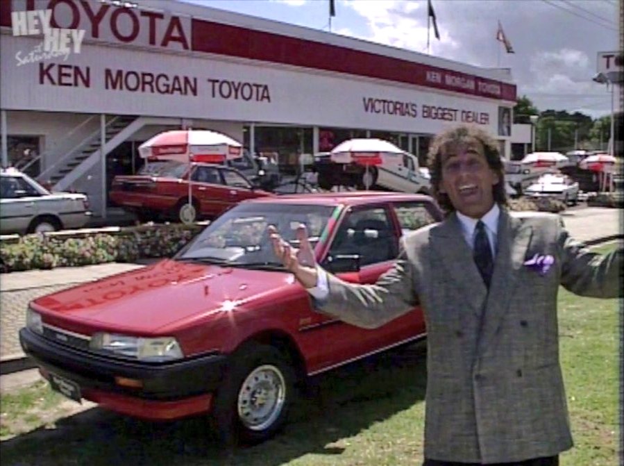 oldshopsoz's tweet image. Bring out Daryl's Wheel and a cameo from Ken Morgan of Ken Morgan Toyota, handing over the keys to a Camry

#HeyHeyIts50Years