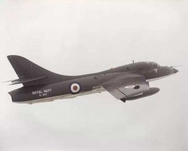HarrierPres's tweet photo. Back with 899NAS and one of its Hunter T.8M, in this case XL602, flying on a training sortie high over the clouds, circa 1983 #HunterT8M #899NAS #HawkerSiddeley https://t.co/xkOlgl0i9k