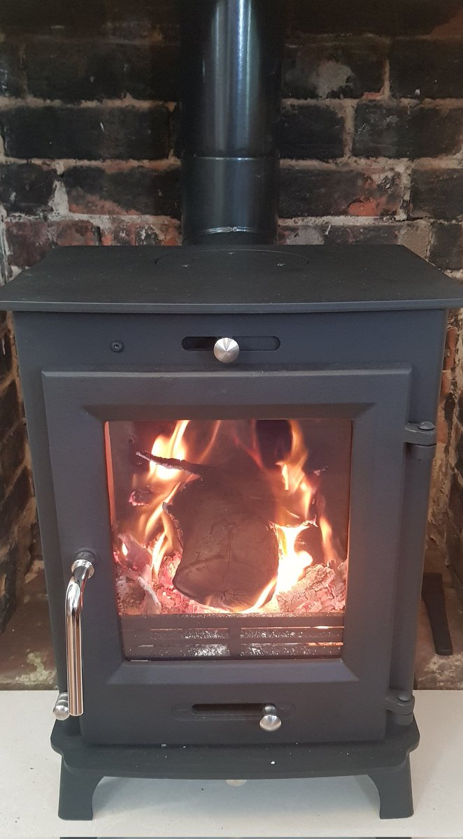 Jonathan_Hoyle's tweet photo. Wood burner is in &amp; throws out more than enough heat for the whole house, the solar panels make over 50% of my electricity. Next step house battery, save the solar when I'm at work use it in the evening. With a few more bits &amp; pieces, off grid or almost off grid looks possible. https://t.co/v0ppHYvHxc