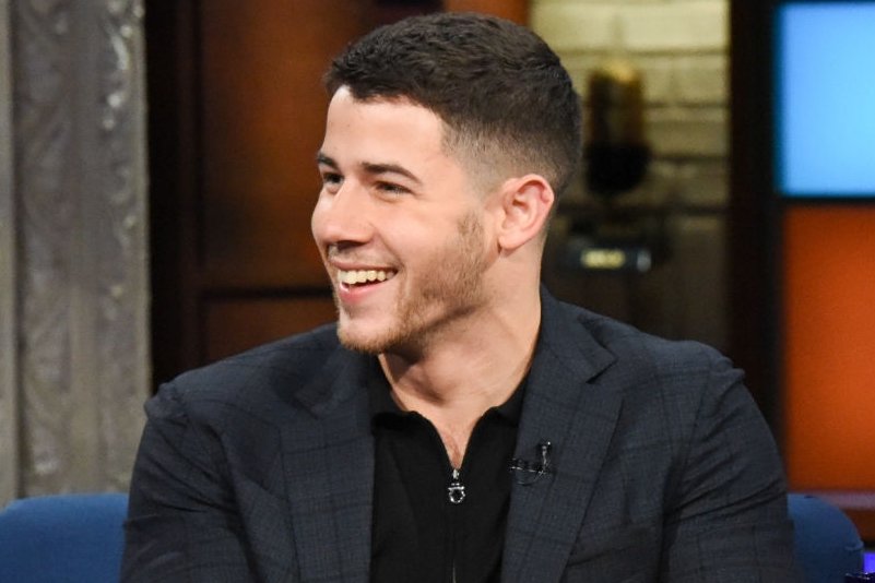 today i woke up thinking about him... nick jonas smiling with his teeths.