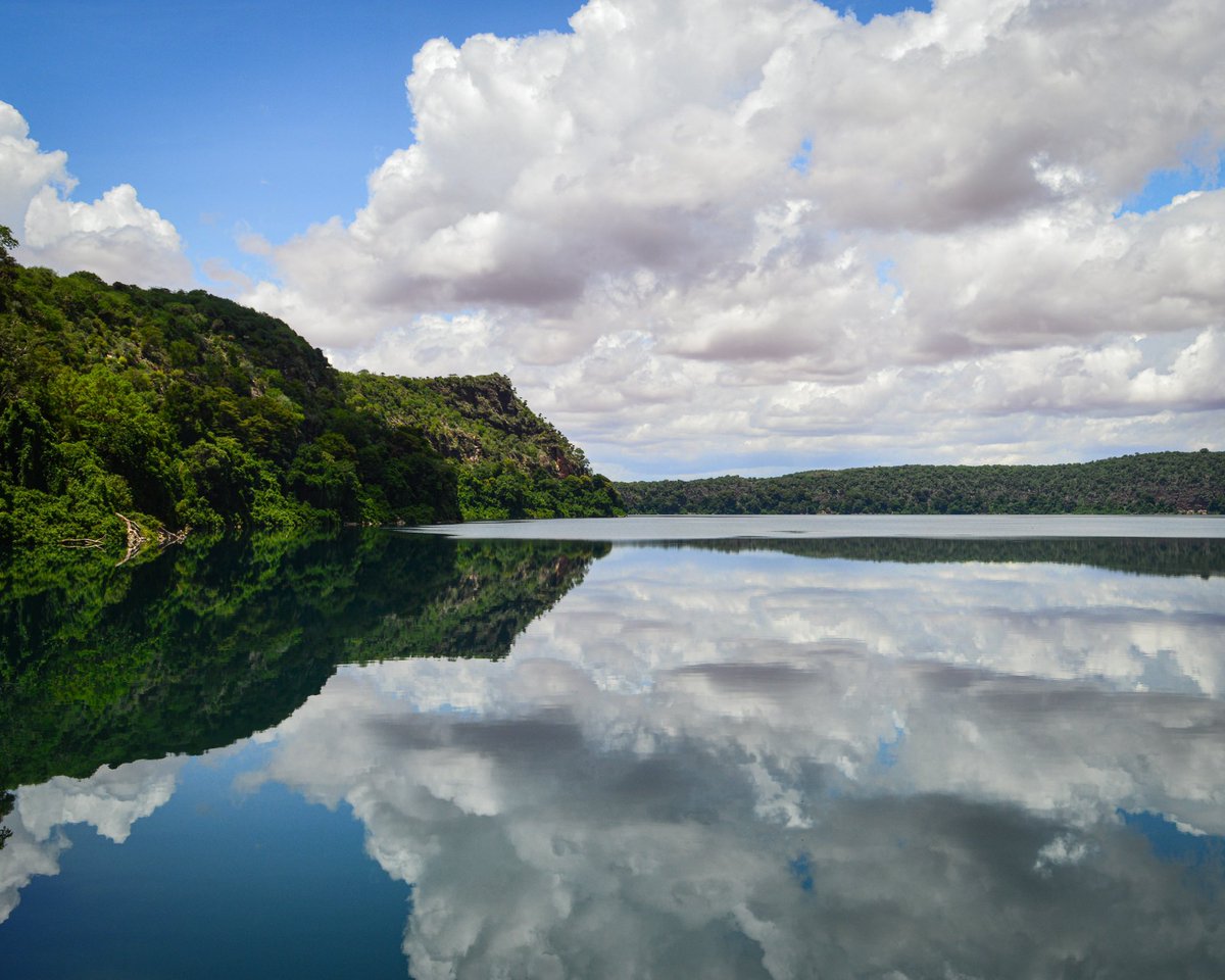 After spending an afternoon with some tribal fishermen in Kenya, they advised me to kayak around a far, remote bend that was one of their favorite places to enjoy the sunshine. Here’s the shot as I came around the corner.