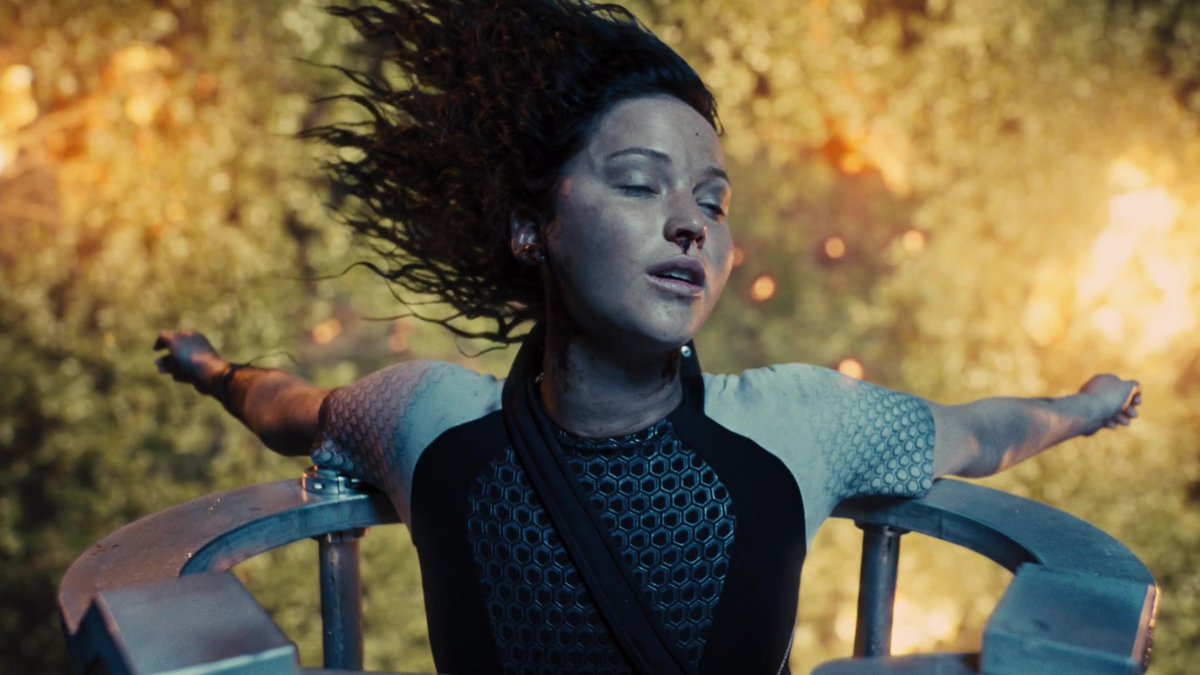 Сойка пересмешница постер. Песня из голодных игр. Песня из голодных игр. The hanging tree james newton howard feat. Песня из голодных игр.