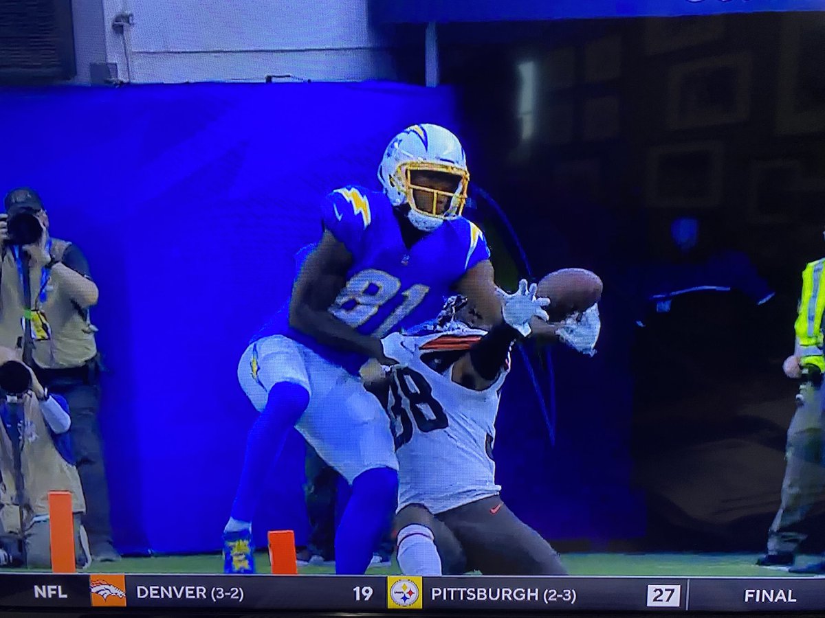 The Chargers were able to score the game-tying touchdown because some official decided THIS was defensive pass interference on a 4th-and-4 play. Unbelievable.