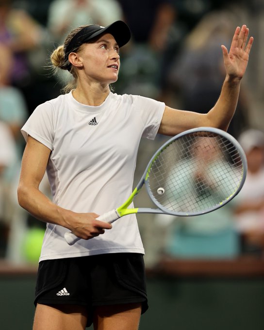 Aliaksandra Sasnovich of Belarus waves to the crowd after her straight sets victory against Simona Halep of Romania during their third round match on Day 7 of the BNP Paribas Open at the Indian Wells Tennis Garden on March 10, 2021 in Indian Wells, California.