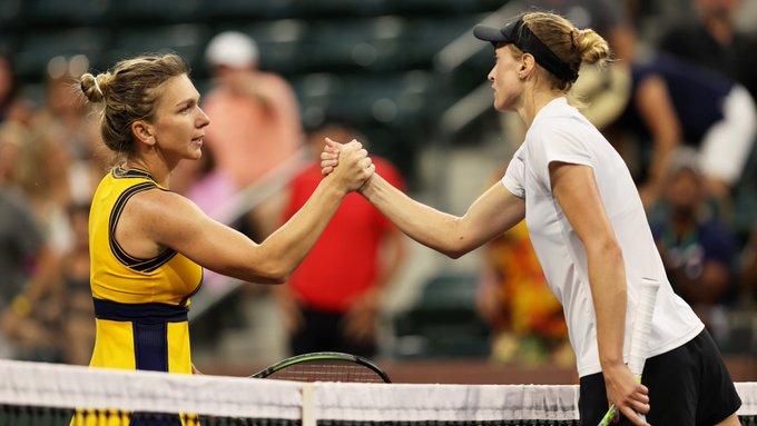 Aliaksandra Sasnovich of Belarus shakes hands at the net after her straight sets victory against Simona Halep of Romania during their third round match on Day 7 of the BNP Paribas Open at the Indian Wells Tennis Garden on March 10, 2021 in Indian Wells, California.