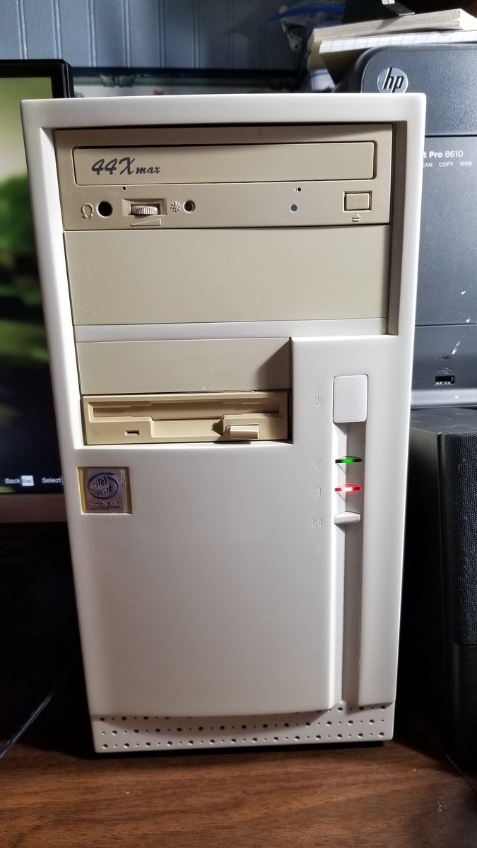 RealFlickScreen's tweet photo. This computer ISN'T what you think.  I restored my first childhood computer from 1999. I worked hard trying to preserve it's original look, even swapping the faceplate of the optical drive! 
#sleeper #Computertechnology #GamingSetup #computerbuilds #restoration #Windows11 #the90s https://t.co/UU1k6O06di