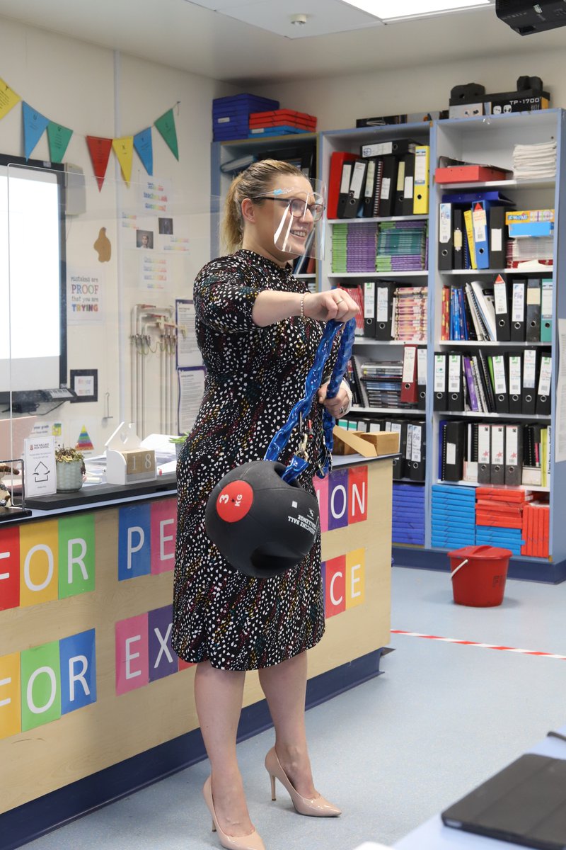 WHS_PhysicsDept's tweet photo. Mrs Davison conducting a non conventional SHM experiment today as she undertakes her Medicine Ball Challenge. She will be handcuffed to the ball for a full week and hopes to raise awareness about mental health issues with pupils and #breakthestigma #MBC https://t.co/F7DYnc6llG https://t.co/94mCD6Ba4I
