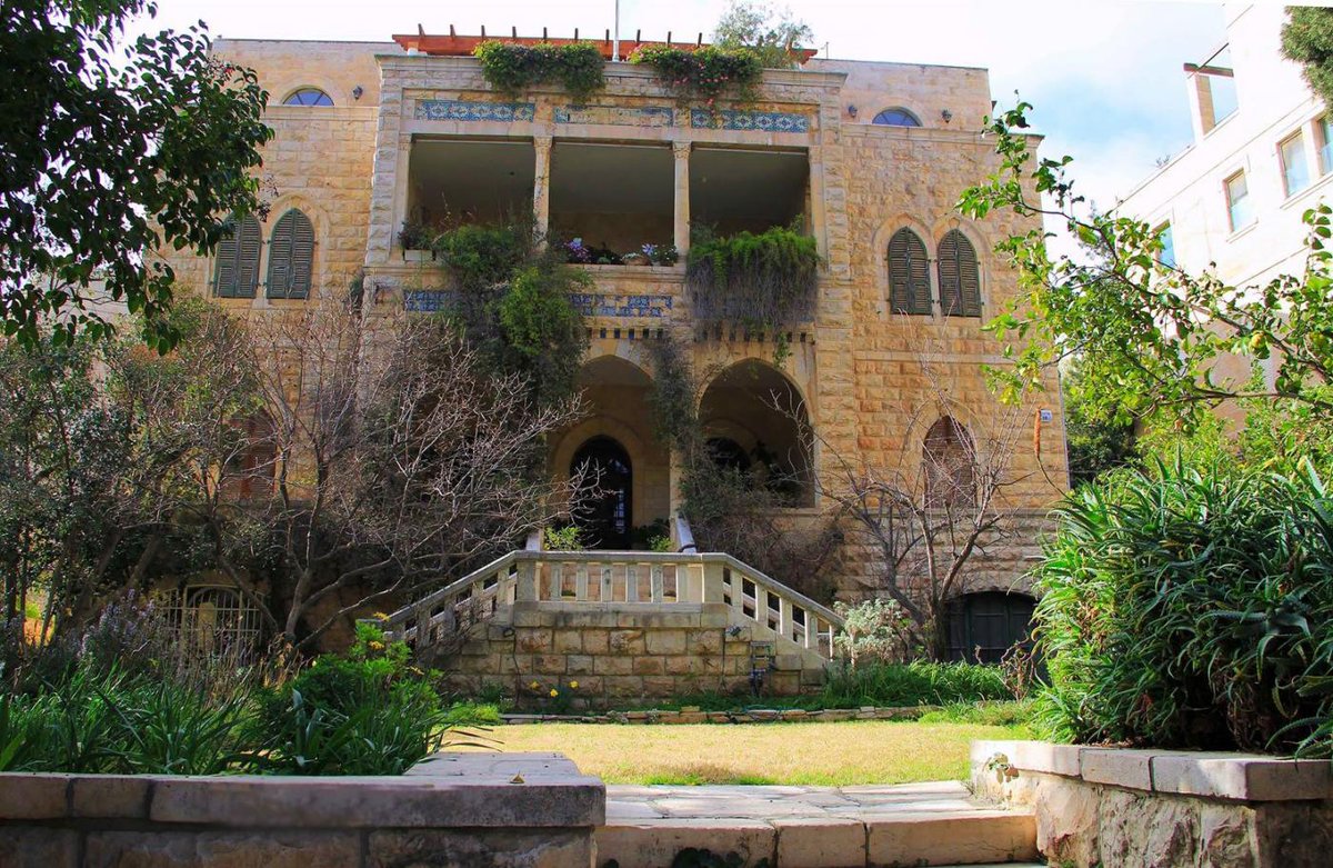 jvplive's tweet image. Hanna Bisharat built his house in Jerusalem in 1926 for his large family (pictured in black and white). After they were expelled during the Nakba, Golda Meir, the PM of Israel who declared "there were no such thing as Palestinians" stole this home and used it as her residence.