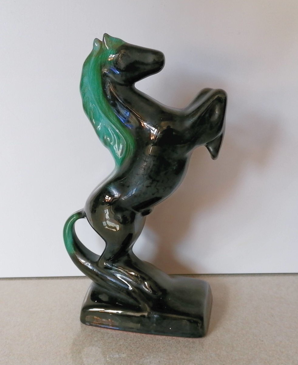 There are two of these lovely horses to be found in my #etsy shop: Collectible Vintage Blue Mountain Pottery Rearing Horse etsy.me/3DA0m7T #green #black #bluemountain #rearinghorse #potteryhorse #horsefigurine #pottery #silverdragonfinds