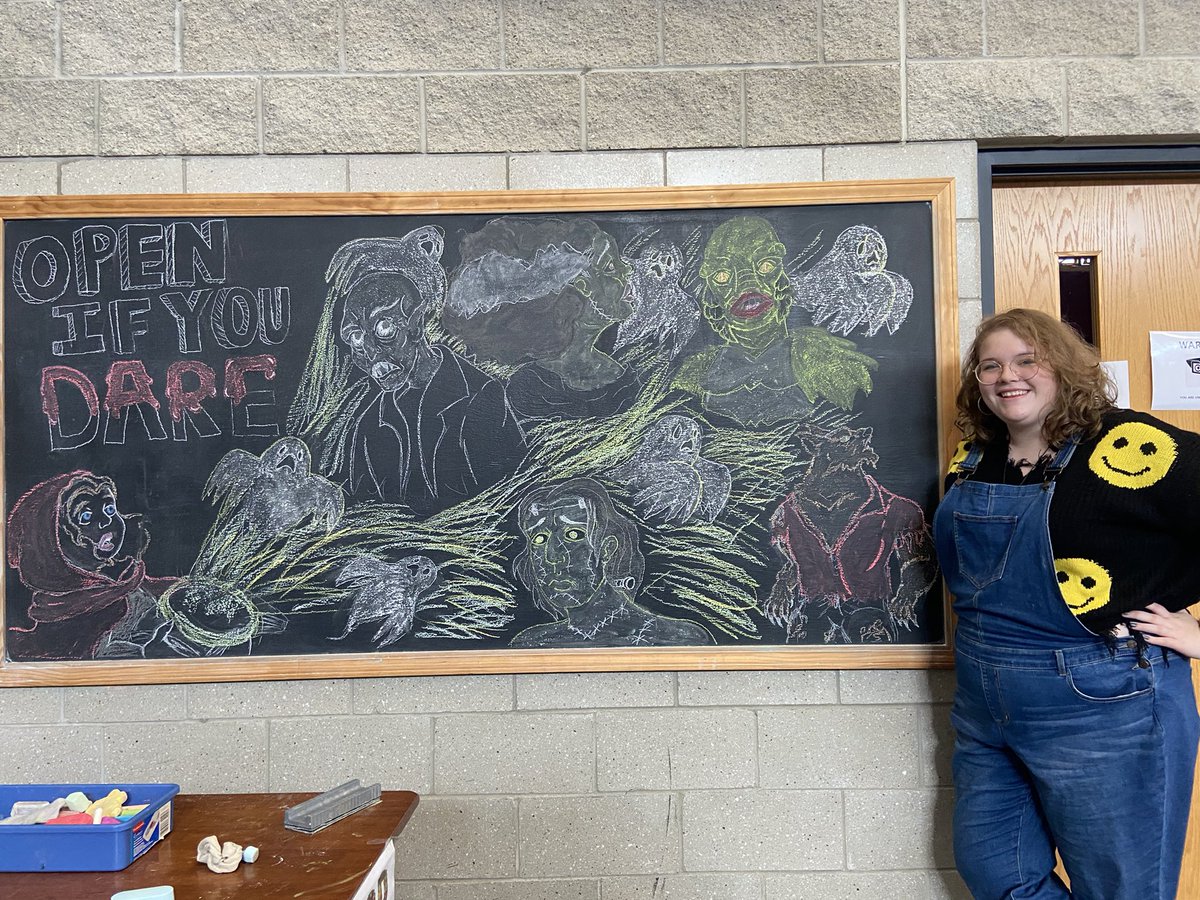 ghslibrary7's tweet photo. Spooky season artwork in the library by GHS senior Livie Day. Such talent! @GoshenWarriors @GoshenLocal https://t.co/Z39cvHpwHU