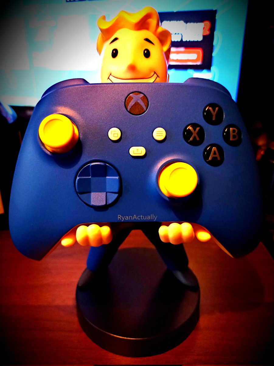 RyanActually1's tweet photo. Only seemed fitting to have my custom #xboxdesignlab controller that I won being held by the character the controller is themed around ☺️ #Xbox #Fallout #VaultBoy #RyanActually #XboxController https://t.co/rf0yTmgSJI