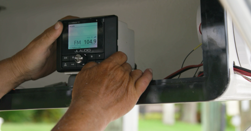 boatingmagazine's tweet photo. With some help from @WestMarine, Boating’s Randy Vance recently helped a friend install a new JL Audio system on his Flats #centerconsole #boat. #DIY #audioinstall