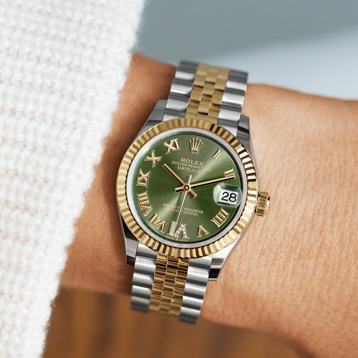 The classic watch of reference. The Rolex Datejust 31 in Oystersteel and yellow gold, 31 mm case, olive green dial set with diamonds, Jubilee bracelet. #Rolex #Datejust