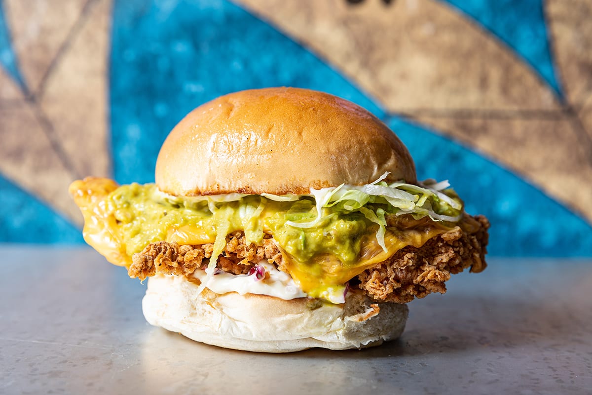 Love the Dirty Chicken Cheeseburger? Love our Green Chili? 
MEAT THE CLUSTERCLUCK... 🐔💚
Fried Chicken Breast, Cheese, Spicy Green Chili Butter, Red Onions, Mayo, Lettuce - all inna' bun