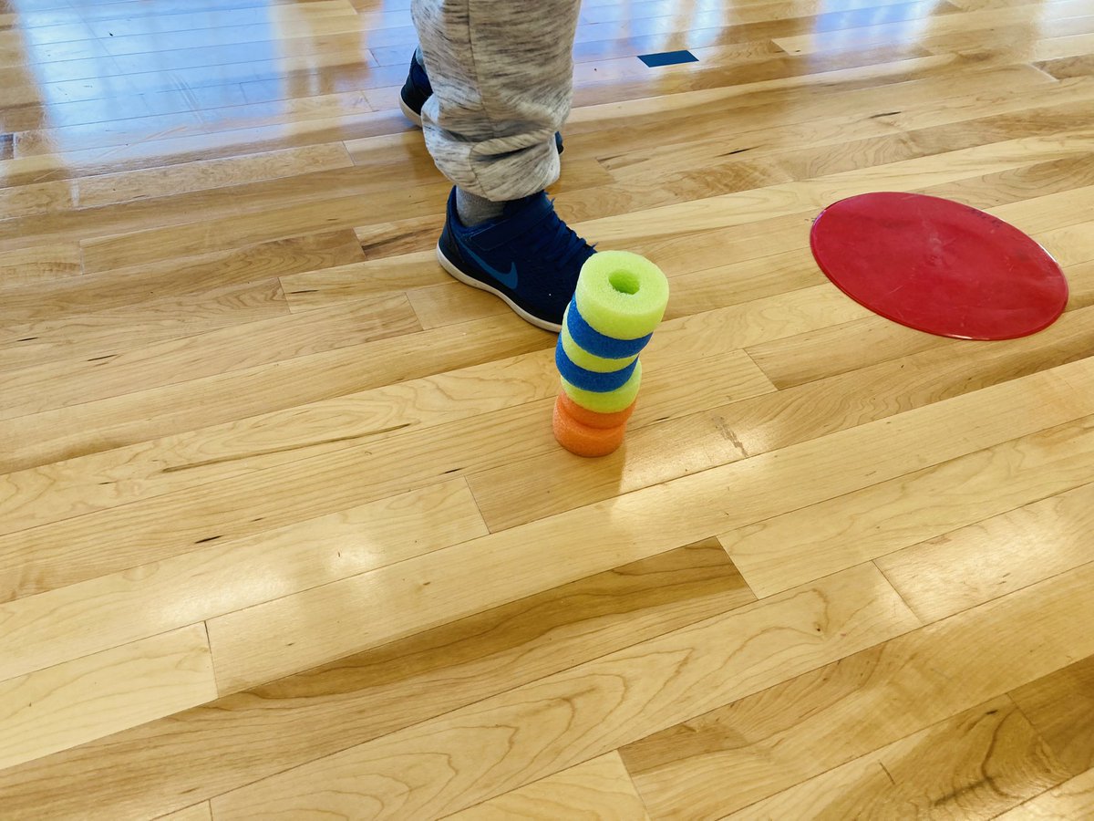 motionfunction's tweet photo. Build-A-Tower underhand tossing to a bucket (target activity). Noodle donut pieces are the points. Partners challenge to build the tallest tower. https://t.co/UO2JnaZEow