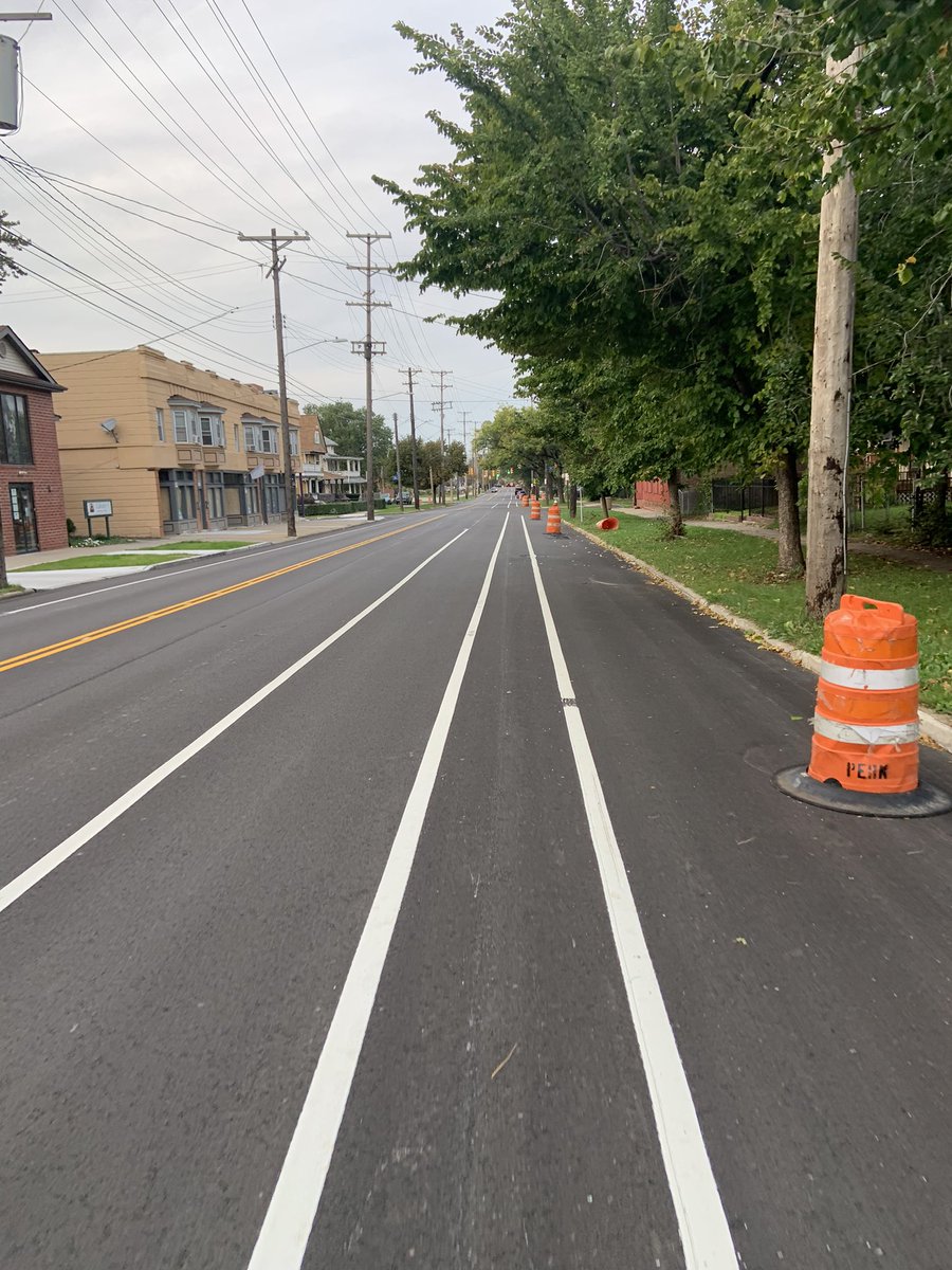 osuadamr's tweet photo. W. 65th striping: Bike lane, parking lane and… buffered parking lane?? https://t.co/f6tzK15Blp