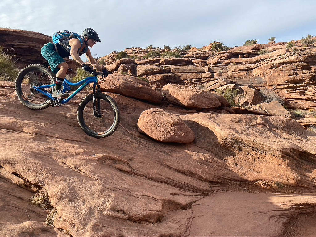 lenzsport's tweet photo. Nicole dropping some of that sick rock in Moab Utah on the Sesh. #lenzsport #29plus #275plus #plusbikes #madeinamerica #devinlenz #plusbikesrule #fatbike https://t.co/OvYzpXC8It