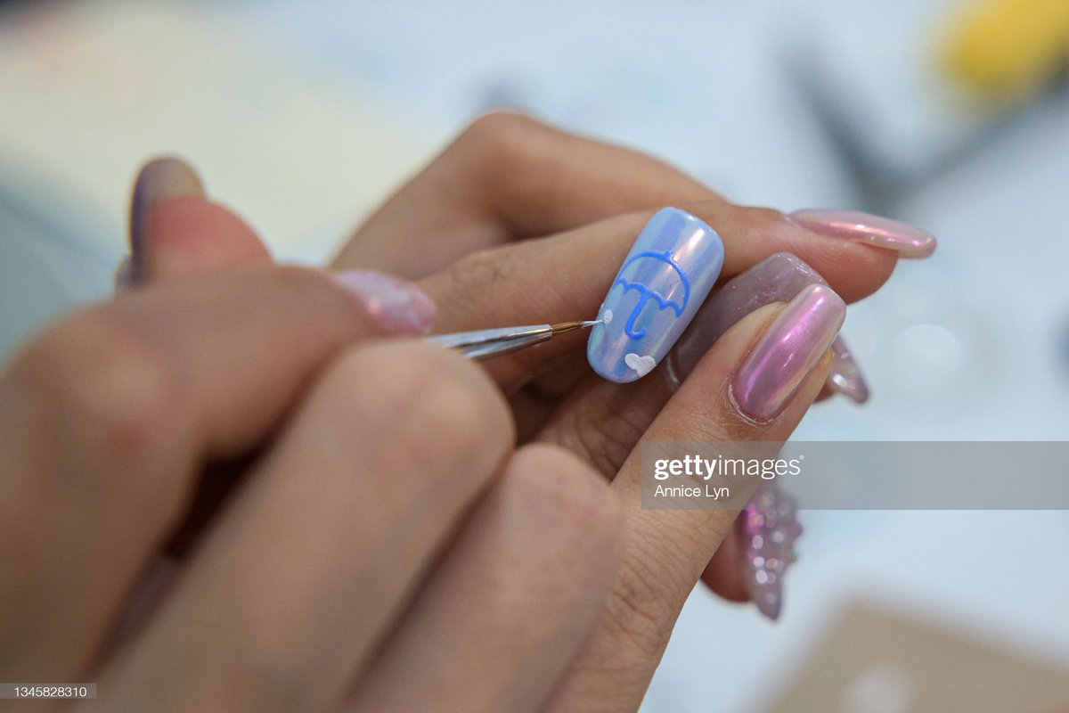 GettyVIP's tweet photo. A "Squid Game" inspired manicure is seen at Maniqure Nail Salon in Sri Petaling, Kuala Lumpur, Malaysia. Customers are invited to play a game at the end of the treatment, and if they win, they can walk away without paying.

More 📸 #SquidGame 👉 https://t.co/ilhsFi8YUt https://t.co/qRMemeq5xN