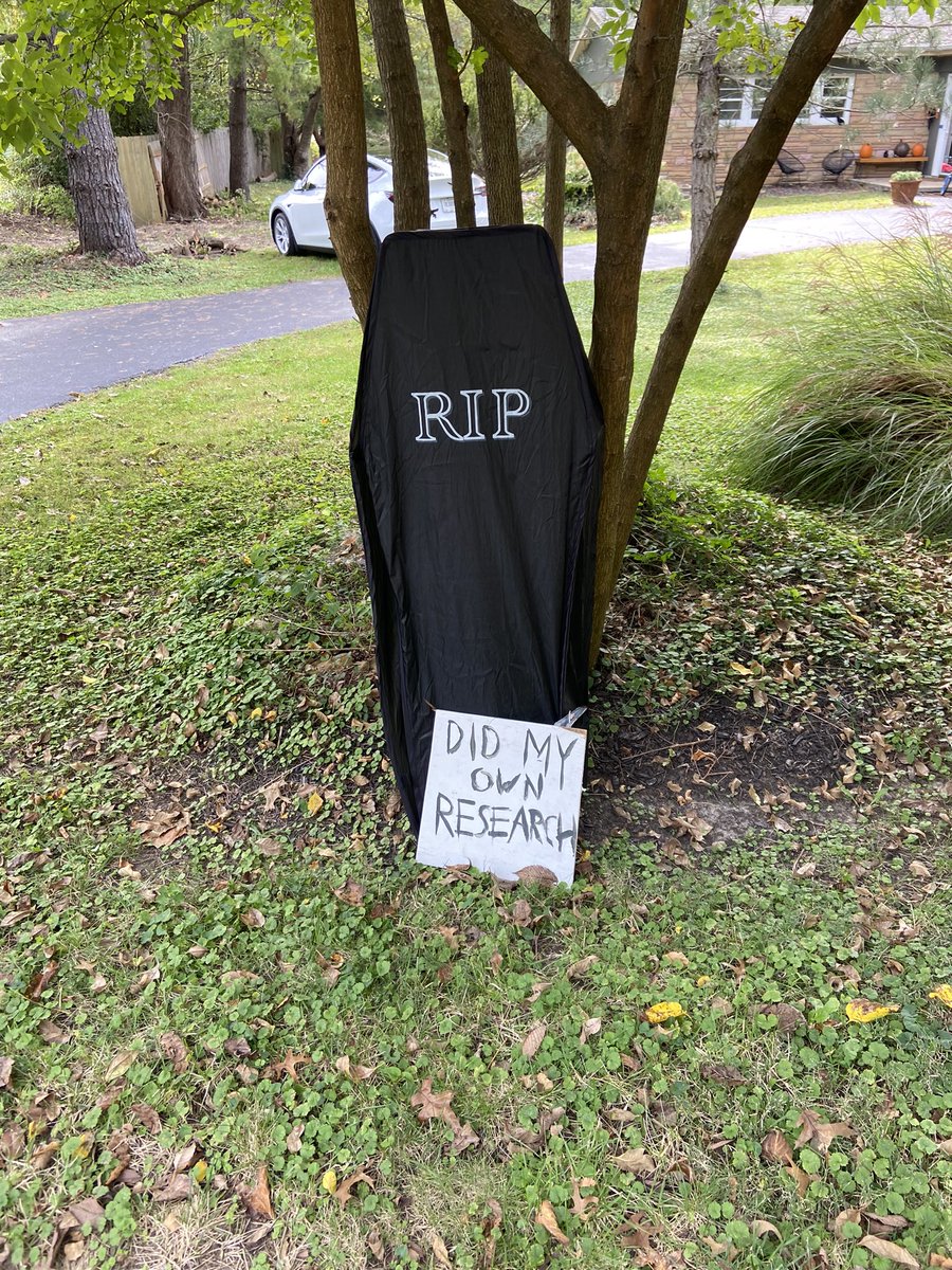Our neighbor put up this tongue-in-cheek, highly topical Halloween decoration. Either the wind, or a triggered snowflake, stole the sign and knocked over the display and they haven’t put it back up. No matter the cause, I was hoping Twitter could help amplify their message!