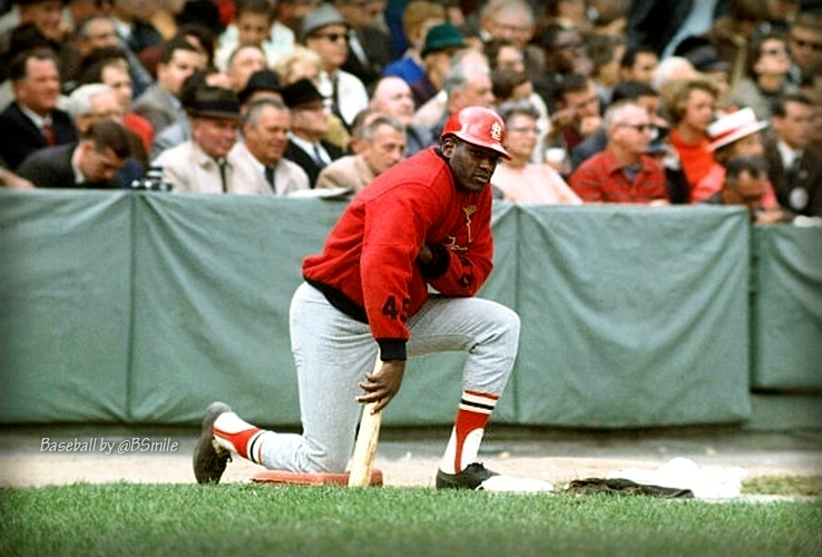 Today In 1967: St. Louis Cardinals legend Bob Gibson waits on deck during Game 7 of the World Series at Fenway Park. Gibby hit a HR, won his third game &amp; was named MVP of the series! #MLB #History #Postseason