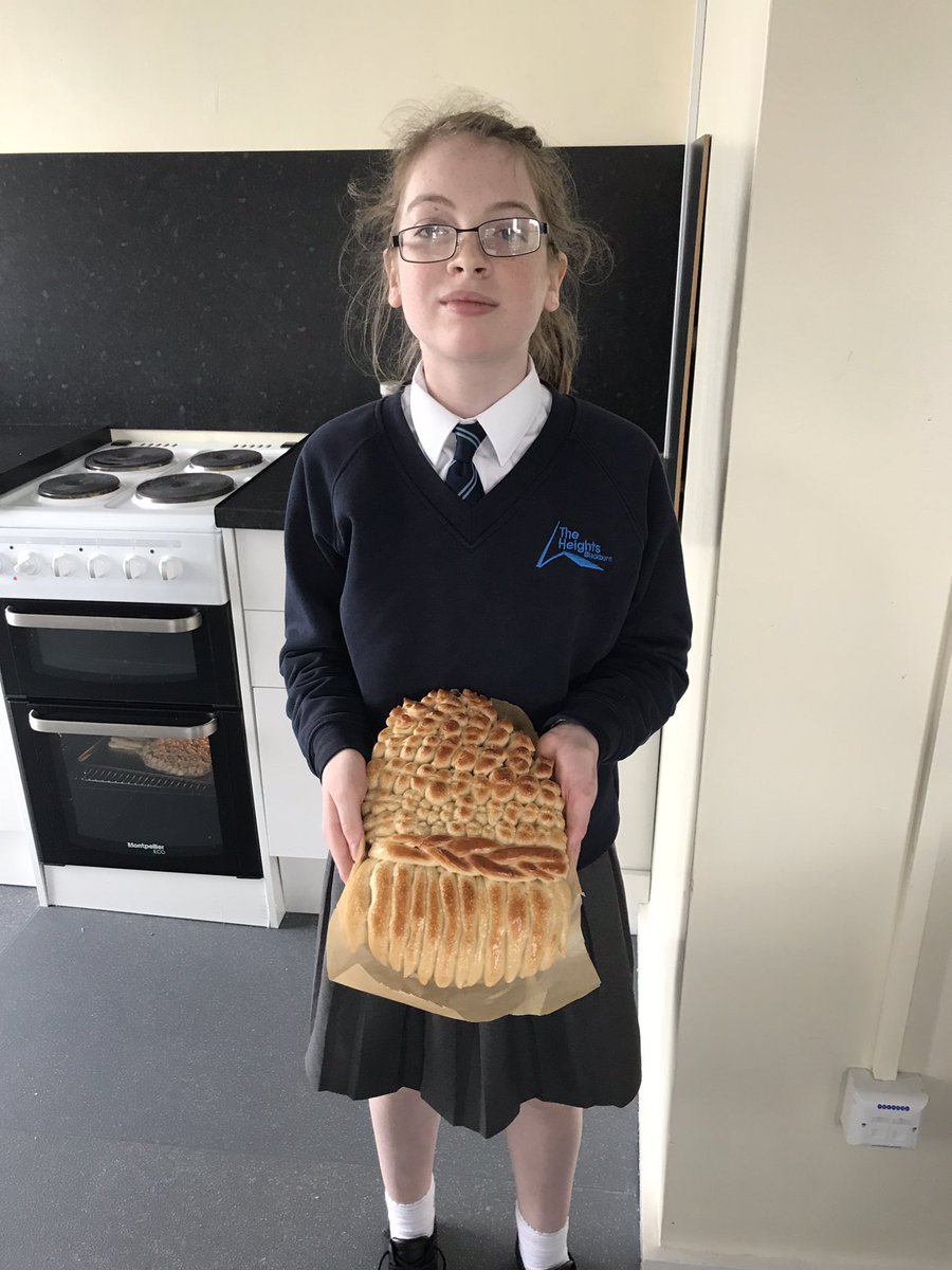 KS 3 student with her harvest wreath @Head_TheHeights