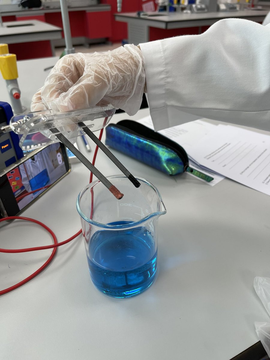 #AmityADYear11 students refreshing their #requiredpractical skills. Today they looked at using electrolysis as a method of extracting copper from copper sulphate solution. Swipe to see the results #PracticalScience #OxfordAQA #AcademicTwitter #FutureScientists