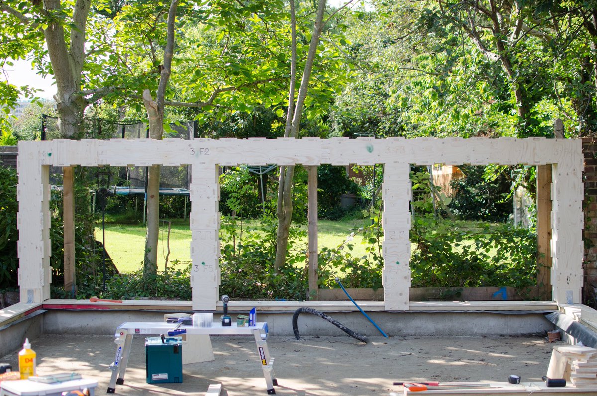 pulpbuild's tweet photo. Day 2-3
.
Always love this view. When portal frames are up and both walls and roof are off.....
.
This is the only #wikihouse in the existence that all three frames are unique
.
Middle frame that about to take apex of #hiproof is double layered laminated 18mm structure ply https://t.co/8zmMEa1Uh3