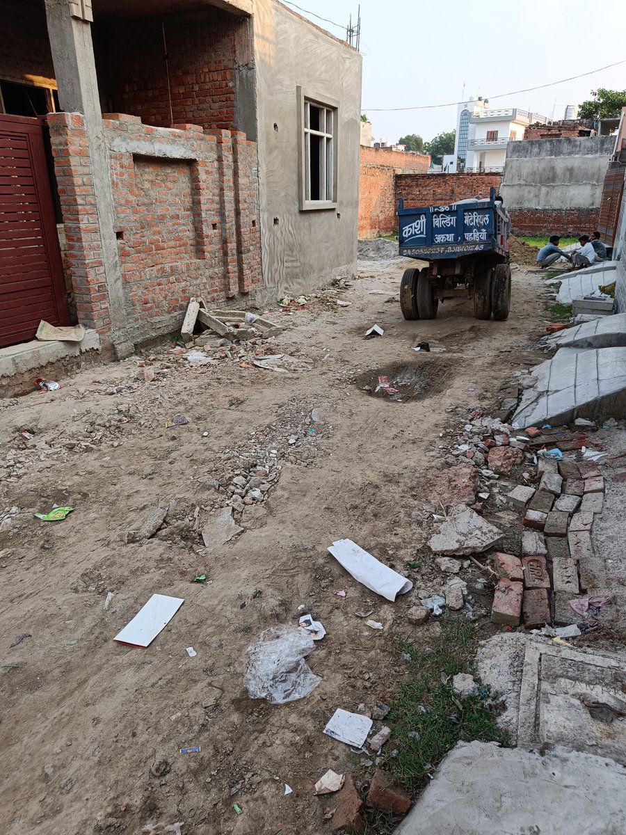 Rishike5h's tweet photo. This is the only road we have for our housing colony in Varanasi. It gets worse in rains. It's been like this for years. We deserve better roads. Please help @nitin_gadkari Sir, Idk if it's your jurisdiction or not but I guess you can do something to help. https://t.co/Ny3RoZGYIS