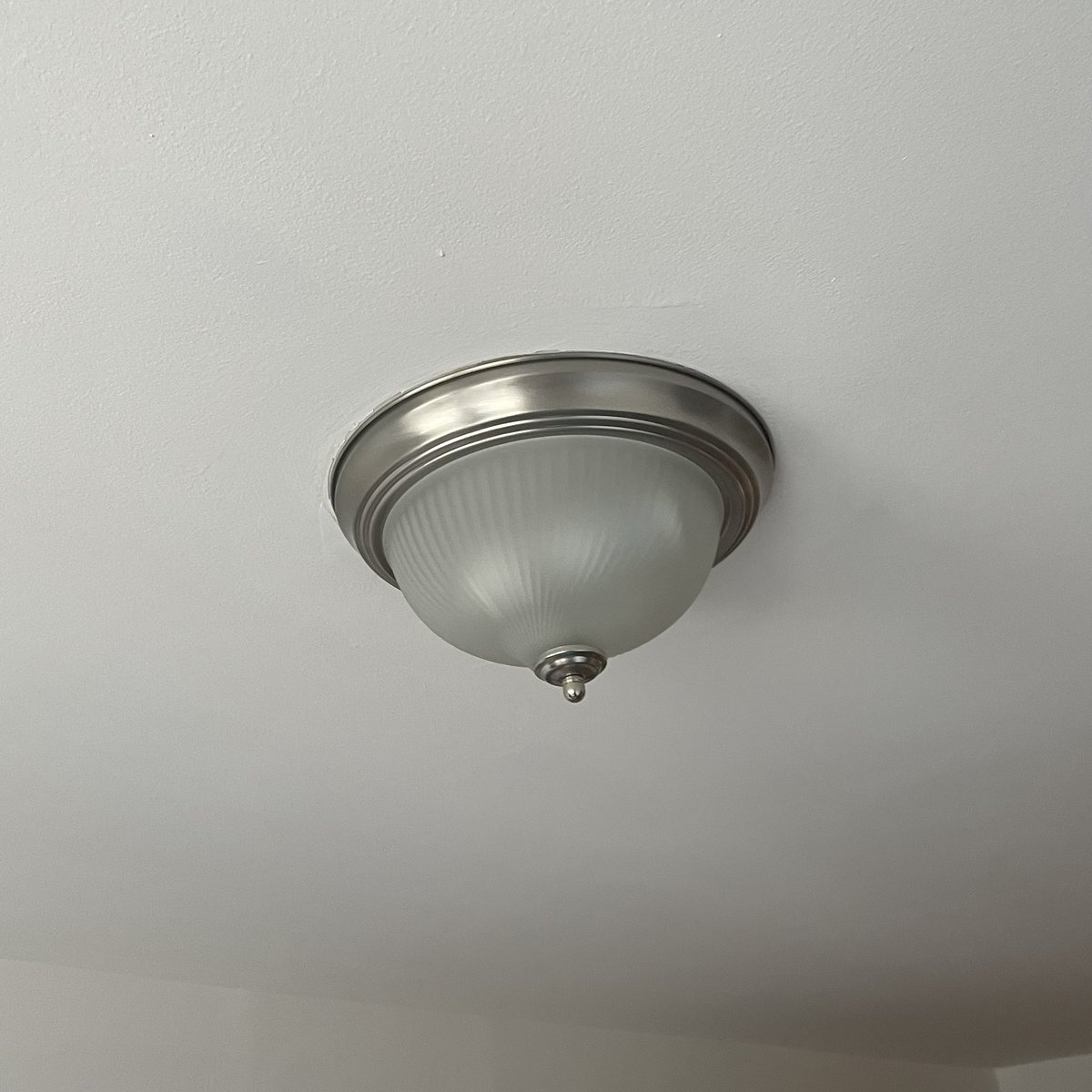 Every apartment I’ve ever live in features the “hanging, naked tit” model of light fixtures.