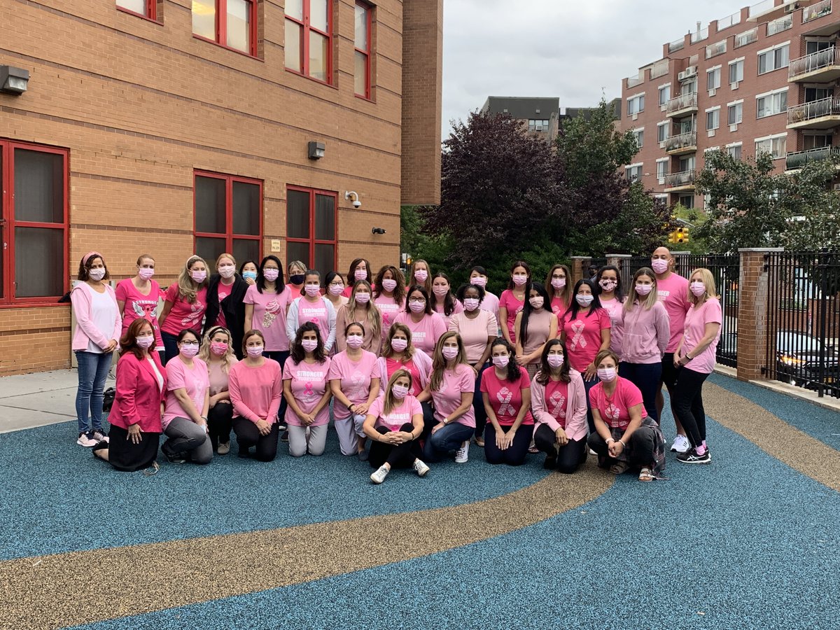 UFT's tweet photo. 1 in 8 U.S. women will develop breast cancer in their lifetime. UFT members across the city are wearing pink today to raise awareness. Here's PS 242 in Queens. #UFTGoPink https://t.co/PEWx7X5kpk