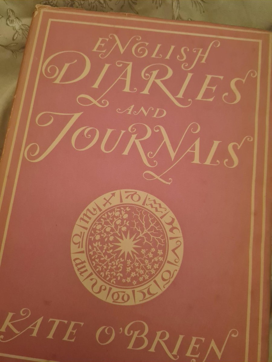 Enjoying a celebratory post-viva glass of wine and this gorgeous treat read, thanks @isdoighliom!