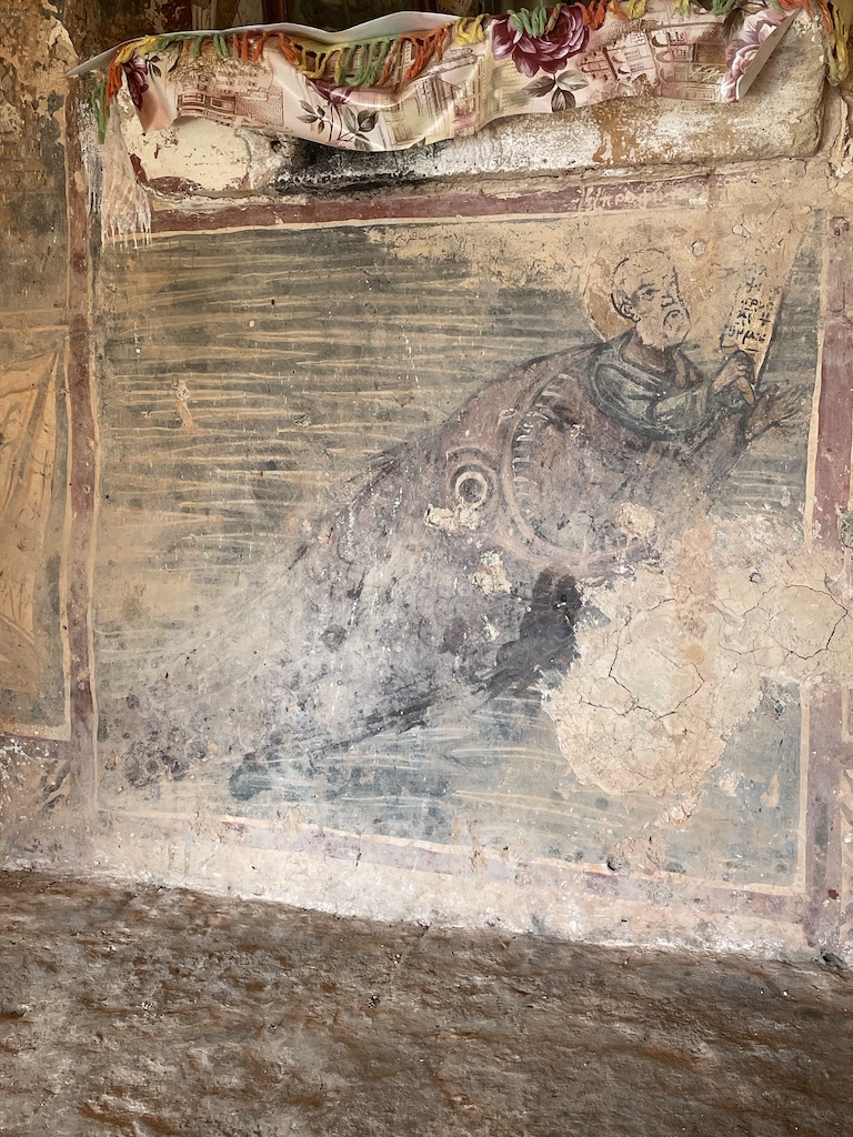 Jonah being disgorged from the whale, an unusual fresco in a tiny chapel above Proasteio, Mani