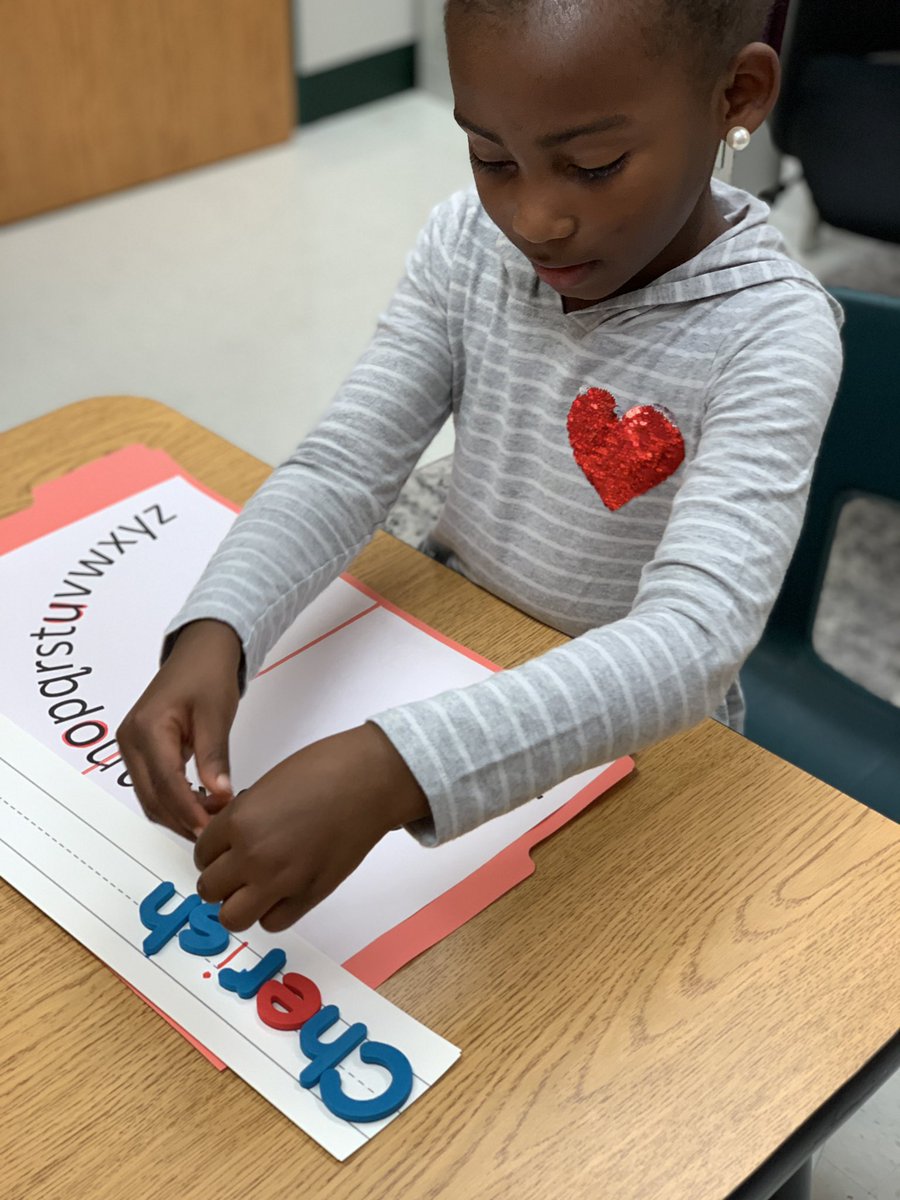 JoleneMoeser's tweet photo. Building our letter/sound recognition skills with the ABC arc, some letters & a name card. We even made up a catchy tune to help her remember how to spell her first & last name! 🎵 🎶 #wsdlearns #soarlikeahawk https://t.co/ayoyX3kVdd