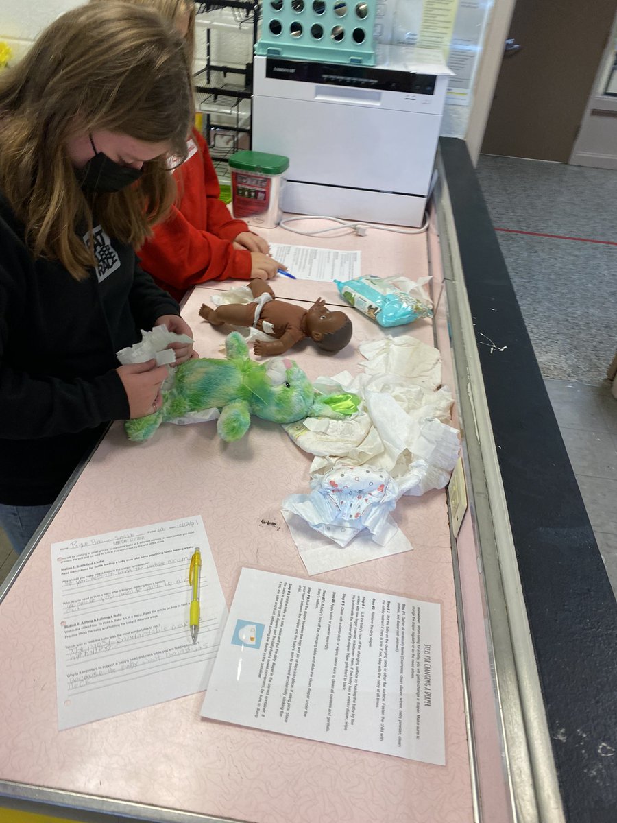 7th graders are getting hands on practice with feeding, diapering, swaddling, holding, and dressing babies this week!!