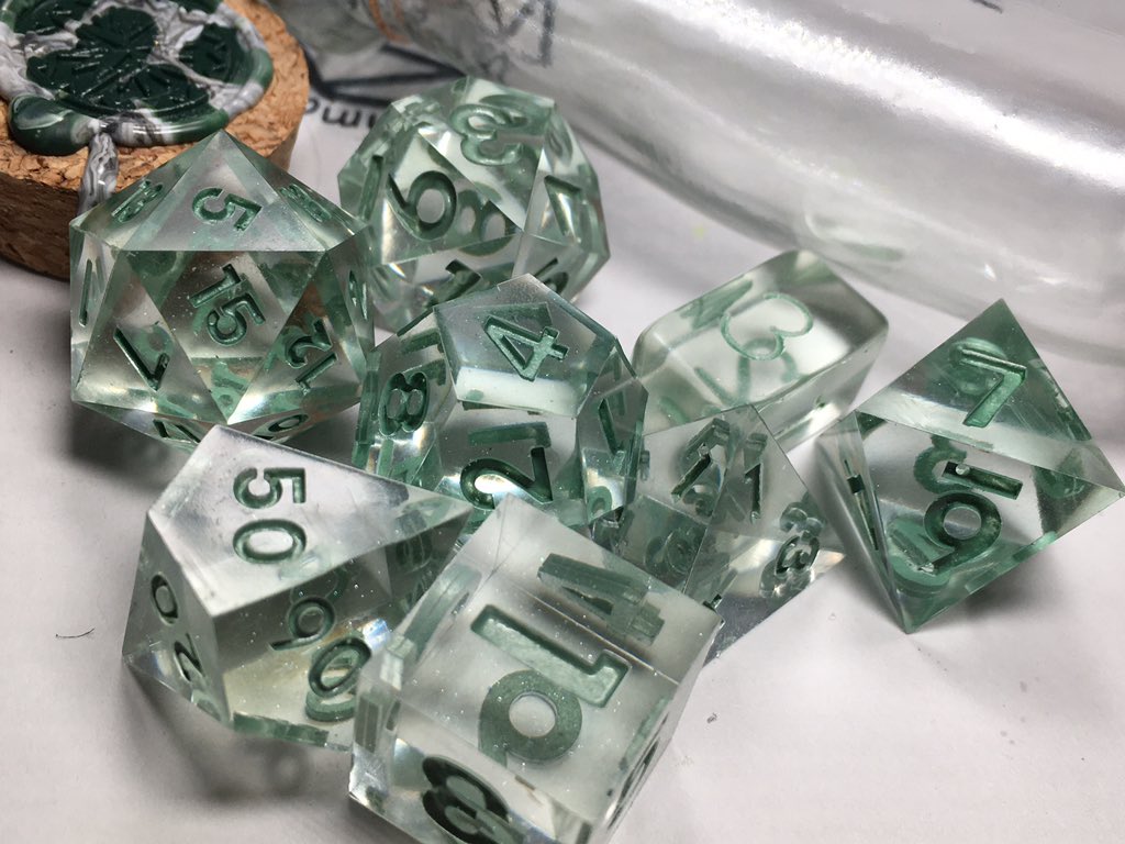 LetoAnimas's tweet photo. More sets! I’ve got a shelf not so slowly filling up with all the sets I’ve been making. Here’s Vaporwave, Magical Reagents and Faux Sea Glass. #dice #handmadedice #dnd #resin #clickclacks https://t.co/jFHWJRZiFl