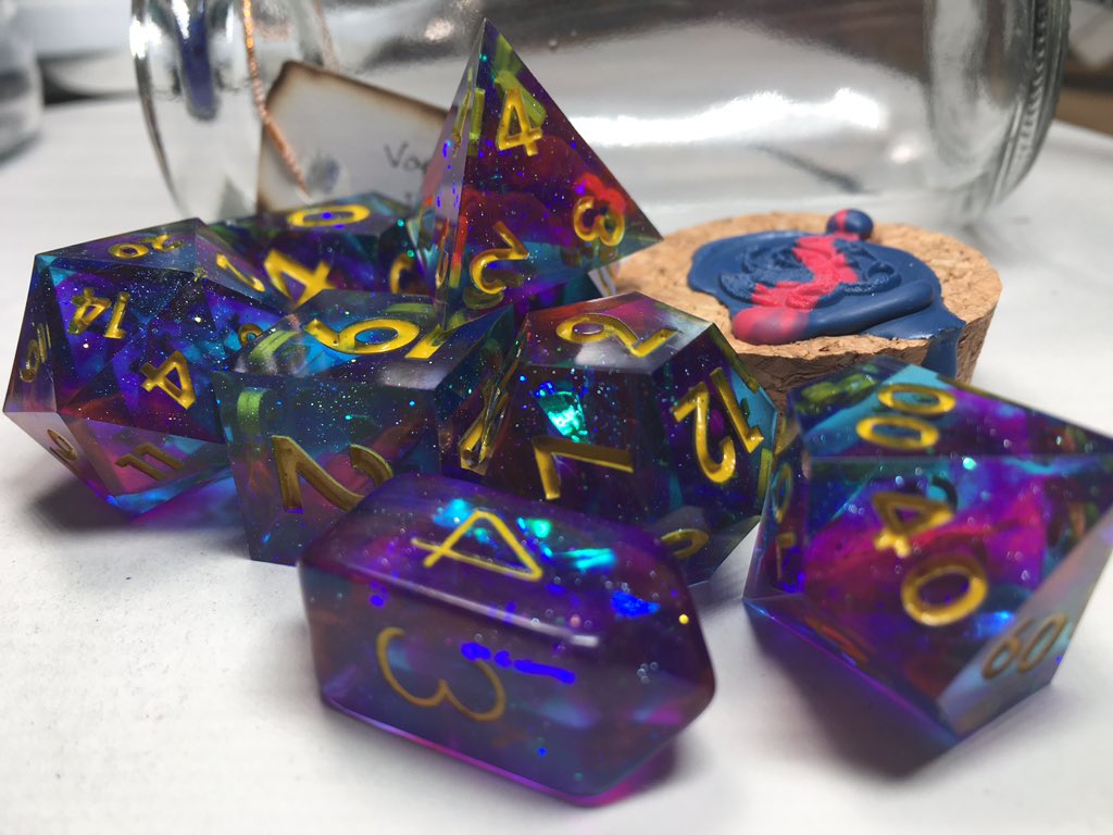 LetoAnimas's tweet photo. More sets! I’ve got a shelf not so slowly filling up with all the sets I’ve been making. Here’s Vaporwave, Magical Reagents and Faux Sea Glass. #dice #handmadedice #dnd #resin #clickclacks https://t.co/jFHWJRZiFl