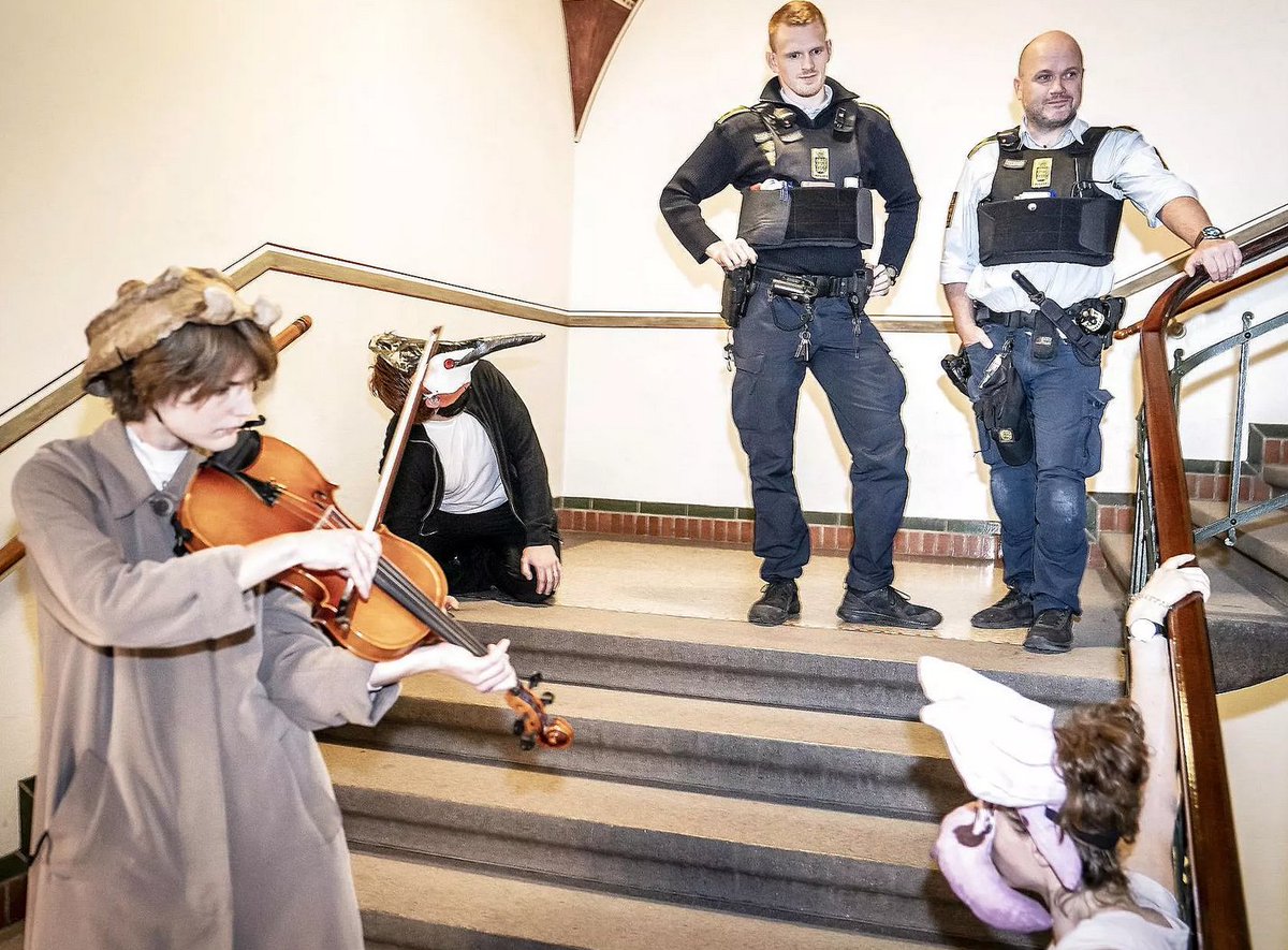 ExtinctionRDK's tweet photo. Yesterday, 17 activists from XR and Arternes Ambassade dressed as insects, plants, mammals and birds from #AmagerFælled and occupied Copenhagen City Hall to demand a halt in construction at natural areas throughout Denmark. 9 rebels were arrested. https://t.co/p0Ix4ok1OC https://t.co/UaENR0xGNm