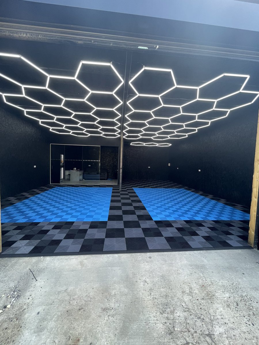 Hexagon Lighting? We’ve got you covered 🏁 #hexagonlight #hexagonlighting #lighting #led #detailing #carwrap #showroom #garage #garagefloor #garagestyle #electrician #detailer