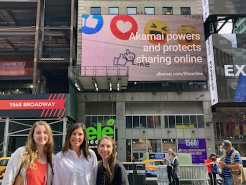 Akamai's tweet photo. Big ideas brought to life on the big screen! Akamai employees take in our #TimesSquare billboard. Stop by, take a selfie, and tag #LifeWithAkamai. https://t.co/7iYLMrR0eY https://t.co/QoAZ4zAzuB